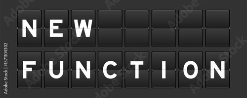 Black color analog flip board with word new function on gray background