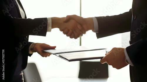 Business handshake sealing deal in modern office environment for corporate partnership