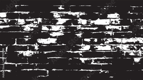 A high contrast black and white image of a brick wall with visible mortar lines and brick texture