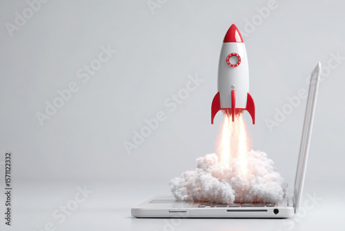 Rocket launching from laptop keyboard with smoke and flames, symbolizing startup, innovation, speed, technology, and creativity. Copy space