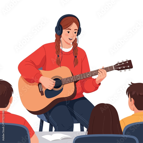 A young woman playing an acoustic guitar, surrounded by attentive listeners, in a music lesson setting.