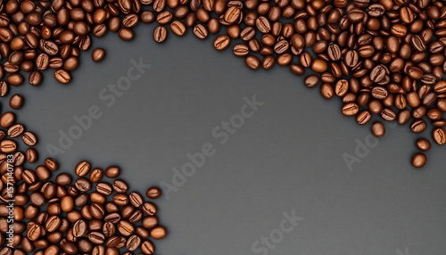Dark surface strewn with rich, aromatic roasted coffee beans, ready for brewing,  delicious,  overhead