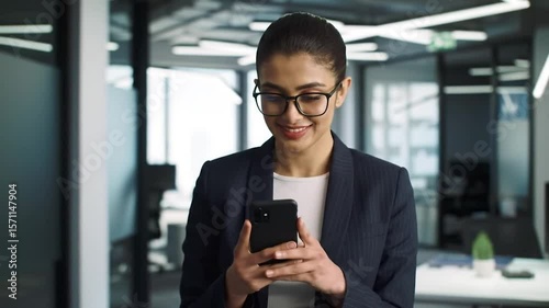 young businesswoman talking on cell phone