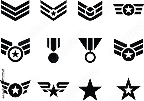 Collection of black military insignia badges and stars
