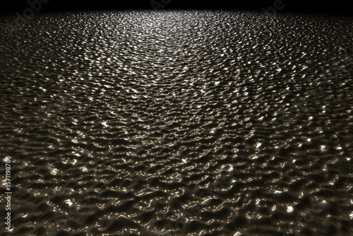 A textured, shimmering surface, dark brown with light highlights
