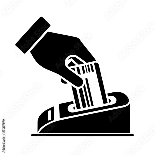 Black and White Vector Silhouette of a Ticket Being Inserted into Machine