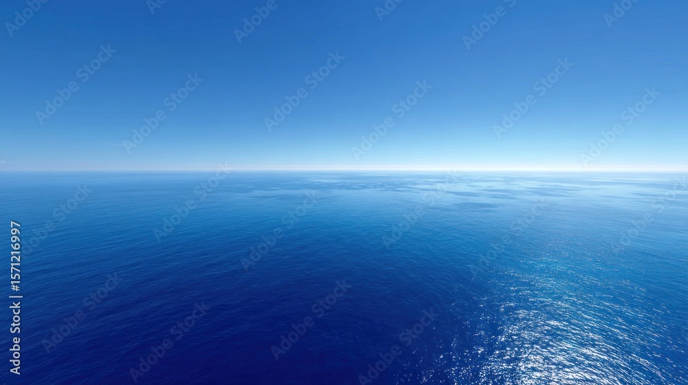 Obraz premium Vast expanse of deep blue ocean under a clear sky
