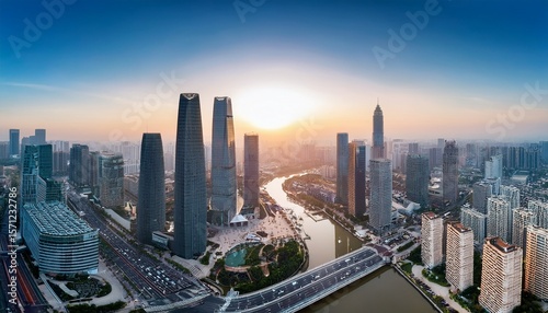 from above you can see ningbo china s skyline and modern buildings as the sun rises this area is the new east part of the city and is ningbo s main business and cultural spot