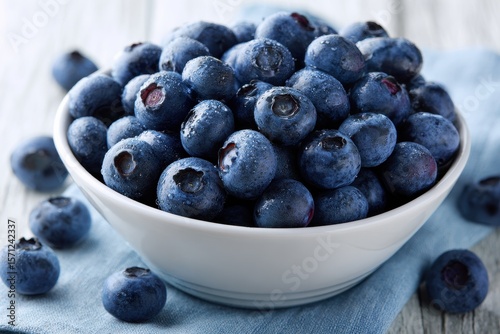 Wallpaper Mural Fresh blueberries in a white bowl on a table Torontodigital.ca
