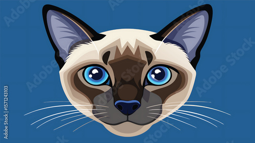 Siamese cat face with striking blue eyes and cream fur brown markings