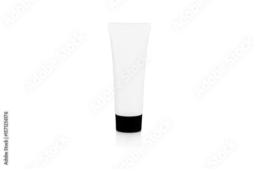 A blank white cosmetic cream tube with a black cap for a product mockup. A container for lotion, gel, or beauty products, isolated on white background with clipping path.