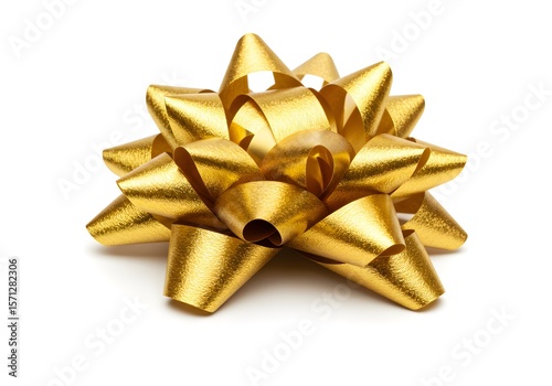 A shiny golden gift bow isolated on white background, closeup shot