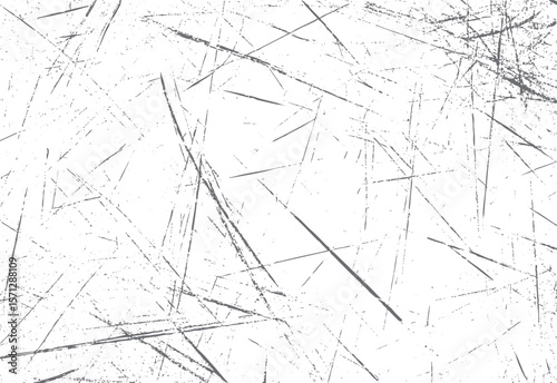 Distressed surface with thin scratch marks. Grunge background with scattered strokes. Ideal for retro overlays and print effects.