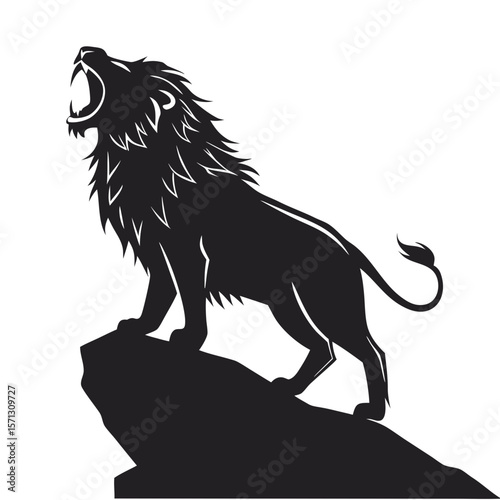 silhouette of a roaring lion standing on a rock