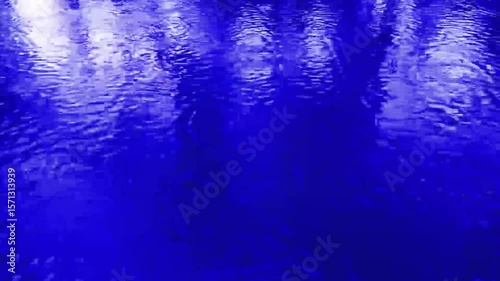 Drop Circle Ripples on blue  Water Surface During Rain  Slow Motion Stock Video