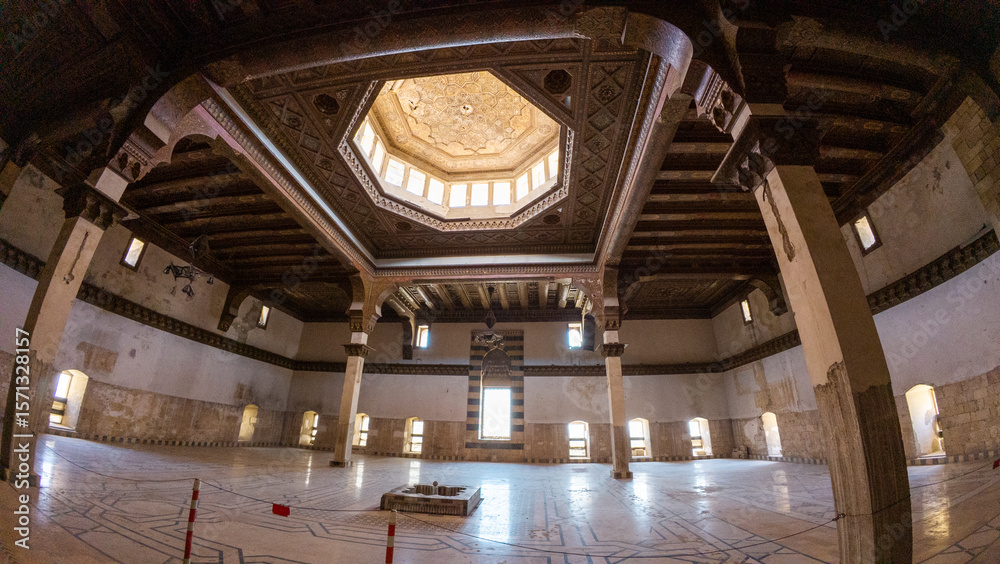 Obraz premium Historic Building Interior with Ornate Wooden Ceiling. Ancient Aleppo city citadel throne room, Syria