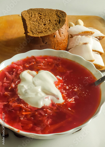 Traditional Ukrainian lunch borscht, lard and rye bread