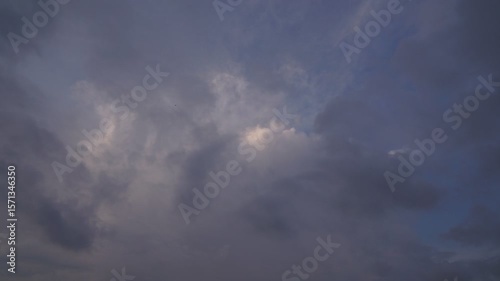 Dawn clouds over the metropolis of early winter sunset