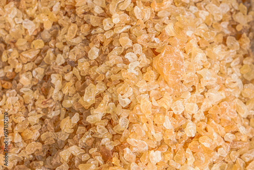 Gum arabic resin (Acacia senegal) , with its granular texture and golden tones, represents a versatile natural ingredient essential in traditional medicine, confectionery, and organic formulations.