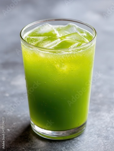 Wallpaper Mural Refreshing green juice with ice in a glass on a gray surface. Torontodigital.ca