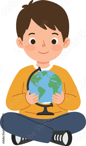 Boy sitting cross-legged holding globe in hands focusing on geography and earth education learning concept