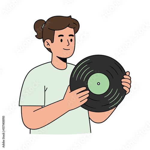 Person with Brown Hair Holding a Vinyl Record