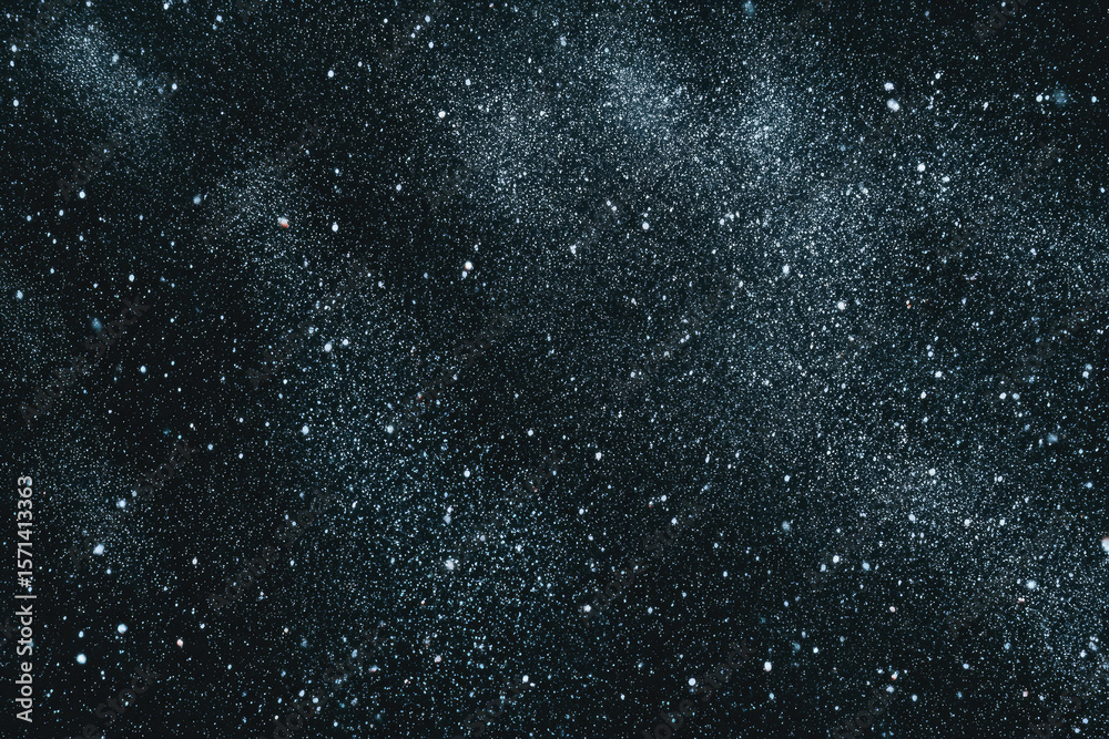 Obraz premium Starry night sky with countless white stars scattered across deep black space, creating dreamy cosmic texture and sense of wonder, perfect for backgrounds or astronomy themes