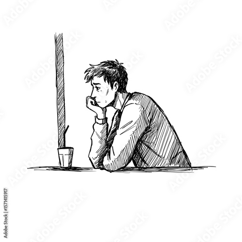 Young man feeling lonely sitting at a table with a drink in a minimalistic style copy space
