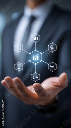 IT Consulting. Businessman holds digital consulting network connecting icon representing IT solutions, focusing on innovation, strategy, optimization, growth, and technology-driven success	