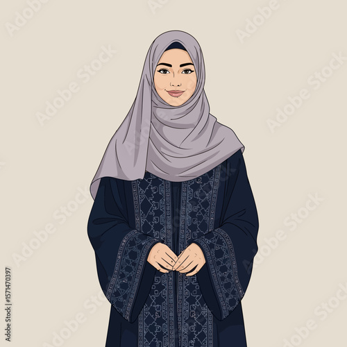 A smiling woman wearing a hijab and traditional embroidered attire, standing.