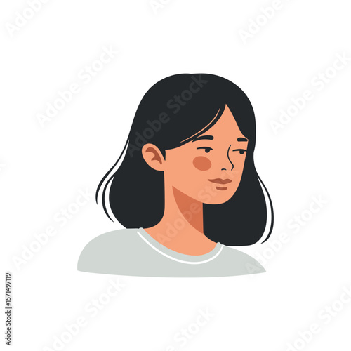 Young woman with black hair looking down with a gentle expression in light colors