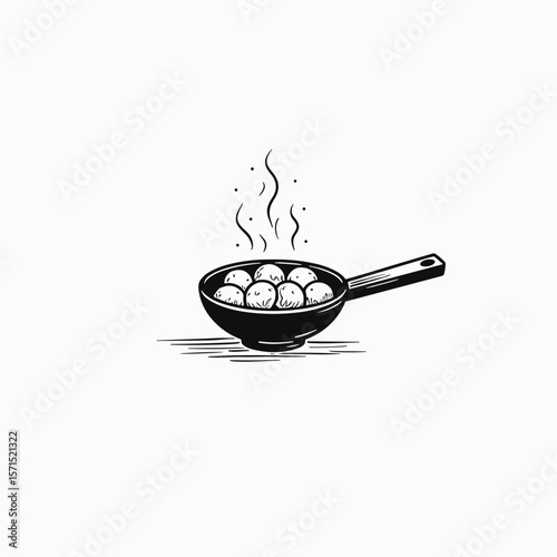 Cooking meatballs in a frying pan with steam rising above  