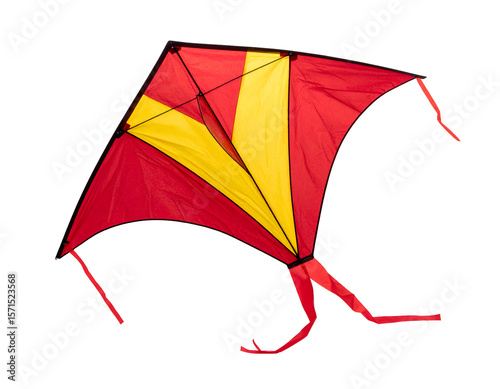 A vibrant red and yellow kite with flowing ribbons symbolizes freedom and outdoor joy.