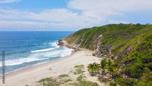 Aerial view of a Mexican beach, at the end of the cliff.