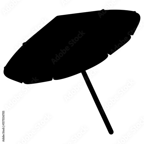 Silhouette of a beach umbrella providing shade on a sunny day
