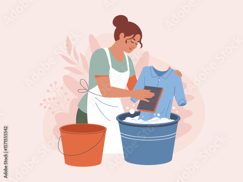 Woman Hand Washing Clothes in a Bucket Sustainable Laundry Practices