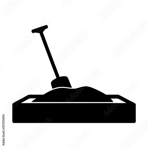 Simple black and white graphic of a sandbox with a shovel