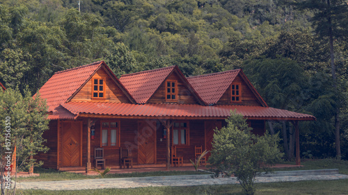 Wooden Mountain Cabins Surrounded by Forest