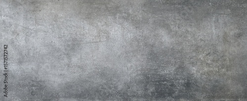 Panel kuchenny z motywem The textured gray concrete surface with a modern industrial aesthetic.