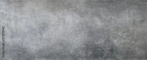 Panel kuchenny z motywem The textured gray concrete surface with a modern industrial aesthetic.