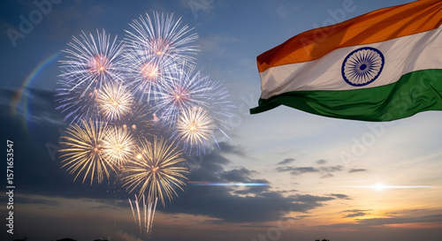 Indian national flag waving in the evening sky with colorful bright fireworks display celebrating independence and republic day with patriotic festive atmosphere
