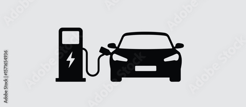Black silhouette of an electric car charging at a charging station