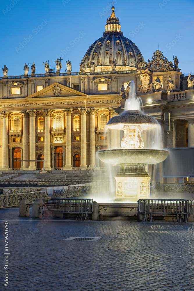 Obraz premium St. Peter's Basilica with fountain in the foreground at dusk. Vatican. Rome. Italy. Vertically. 