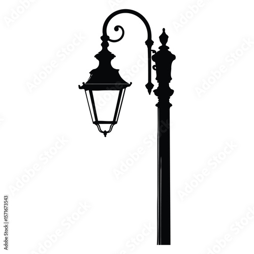 Black silhouette of a vintage street lamp with ornate details