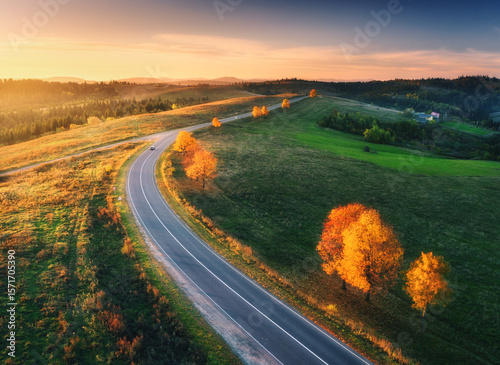 Aerial view of road, hills,...