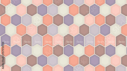 A repeating pattern of pastel colored hexagons with small text on some shapes