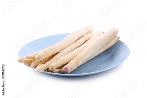 Many raw asparagus spears isolated on white