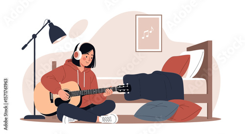 Girl Playing Guitar In Her Bedroom With Headphones For Creative Expression