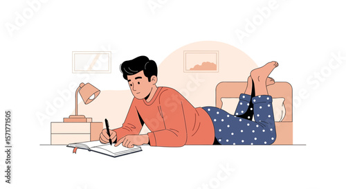 Young Man Lying On The Floor Writing In A Notebook At Home