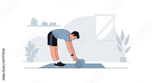 Young Man Prepares For Workout By Rolling Out Yoga Mat At Home